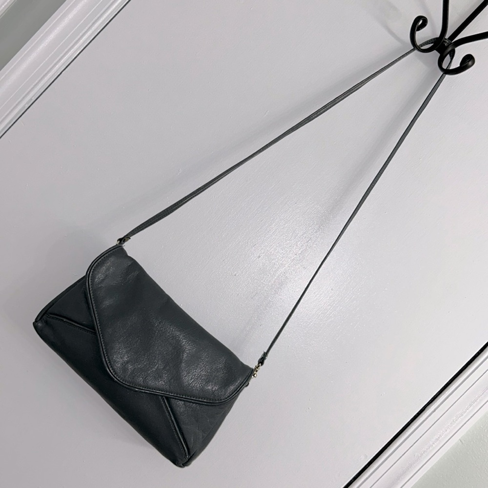 Genuine leather strap purse with snap closure